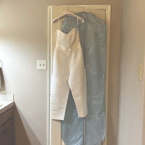 Alexia Maria designer silk faille bow jumpsuit.